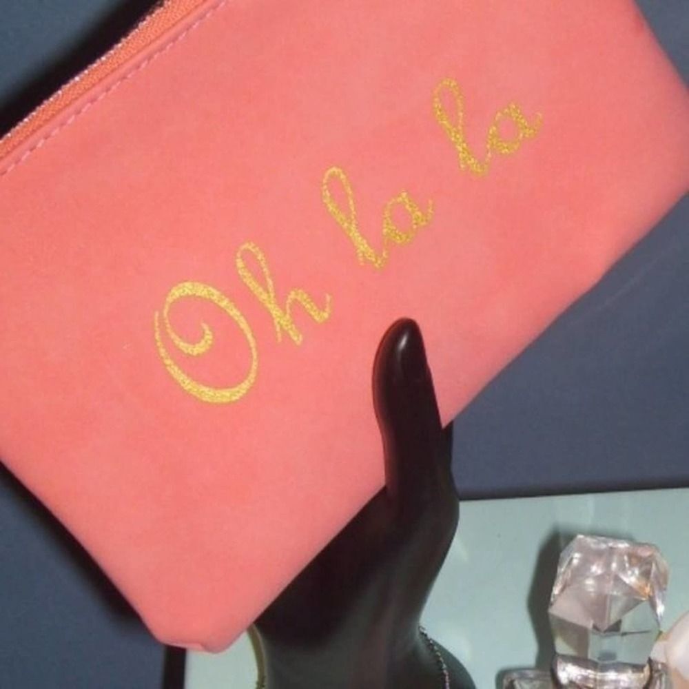 💥5/$10💥 OH OH LA LA melon color clutch/wristlet w/ gold lettering never